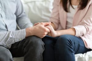 couple apologizing