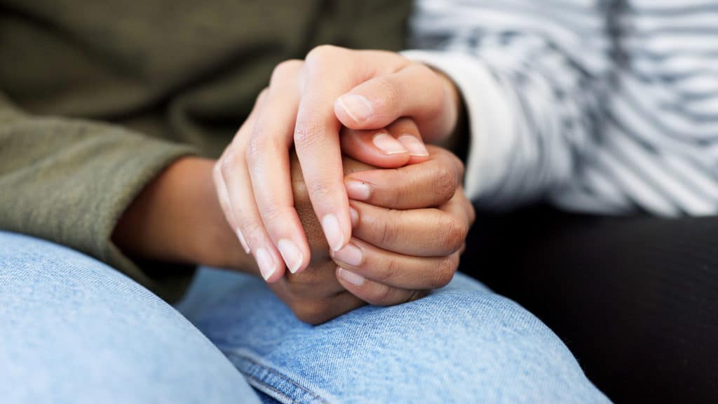 couple holding hands